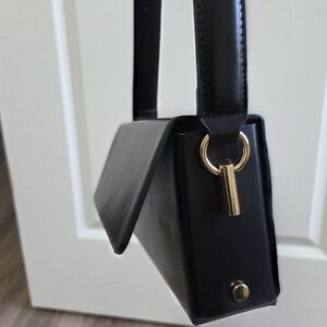 Madison West Black and Gold Handbag